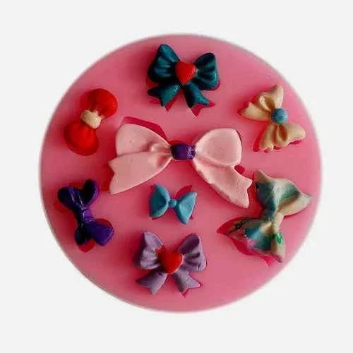 Fiocchi e Papillon. Stampo in Silicone con 7 Fiocchi