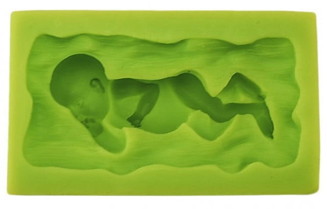 Neonato con ditino in bocca.Stampo in Silicone