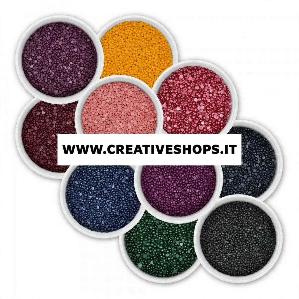 Colorante in grani altamente concentrati per la colorazione della cera delle candele.